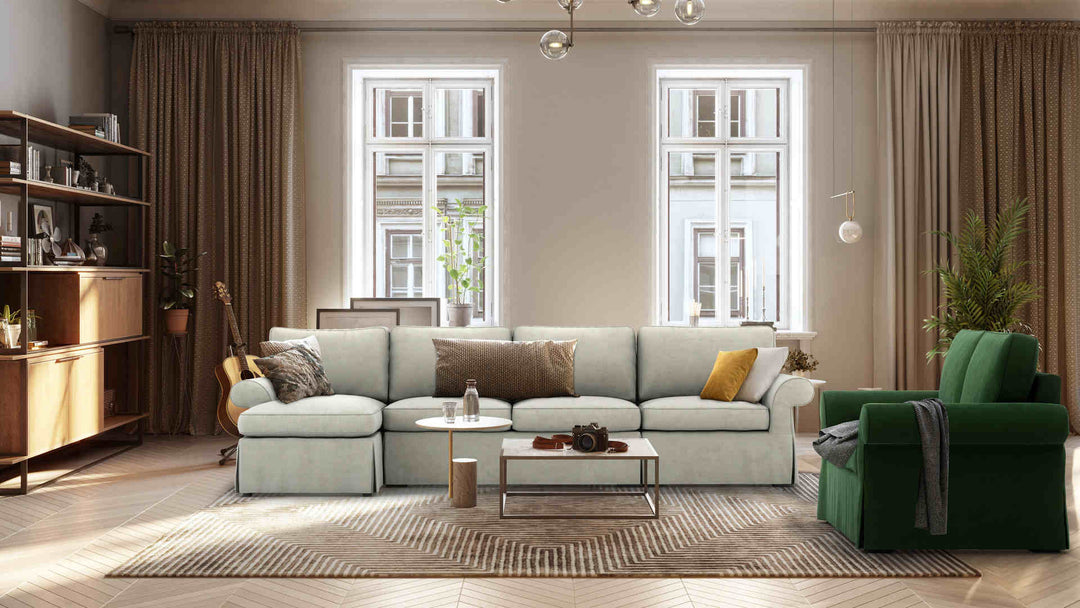 Scandinavian living room with Pottery Barn Pearce Roll Arm sofa in Classic Velvet Forest Green and Performance Weave Stone slipcover