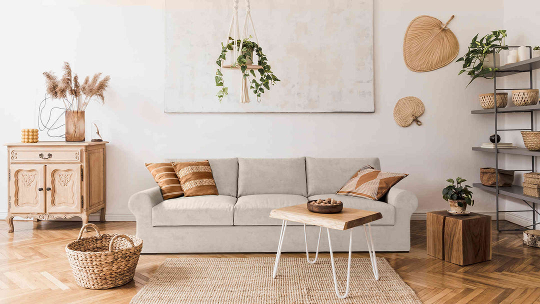 Scandinavian living room with Pottery Barn Turner Roll Arm sofa in Performance Weave Cream fabric slipcover