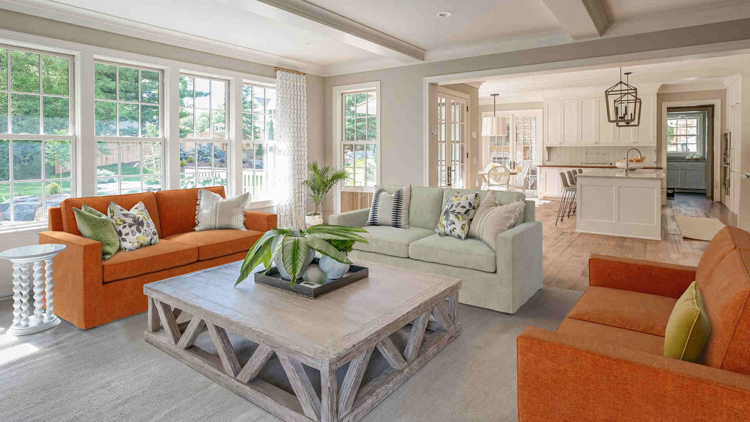 Rustic living room with West Elm Henry sofa in Comfort Chenille Burnt Orange and Performance Weave Stone slipcover