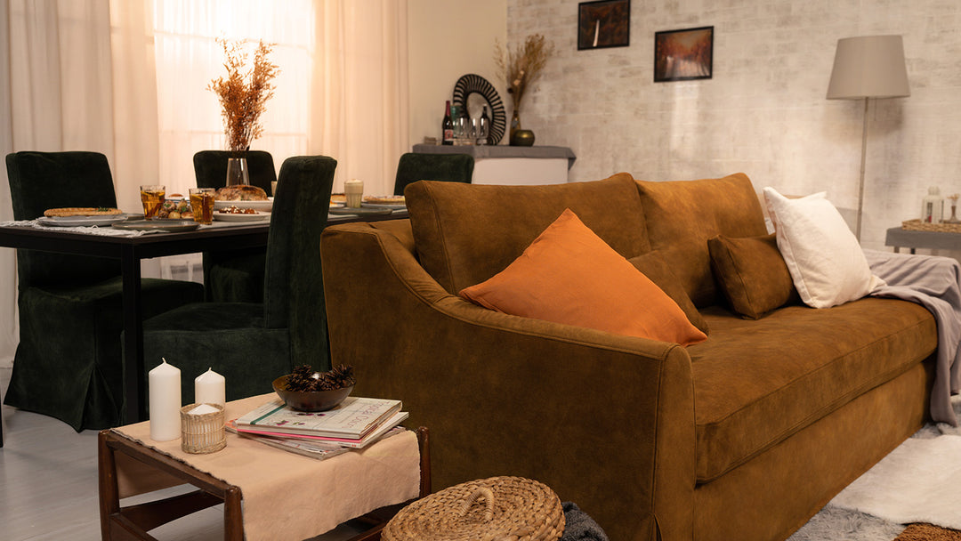 IKEA FARLOV sofa in a Signature Velvet Caramel slipcover and a dining chair with a Signature Velvet Bayleaf slipcover