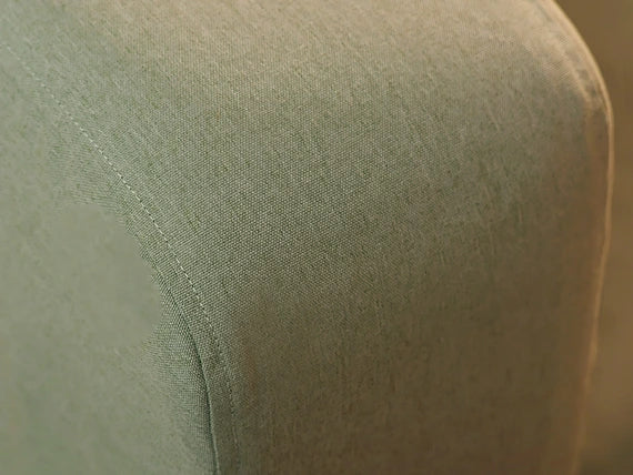 Closeup-of-sofa-arm-IKEA-KLIPPAN-2-seater-with-ComfortWorks-Care+-Canvas-Sage-colour
