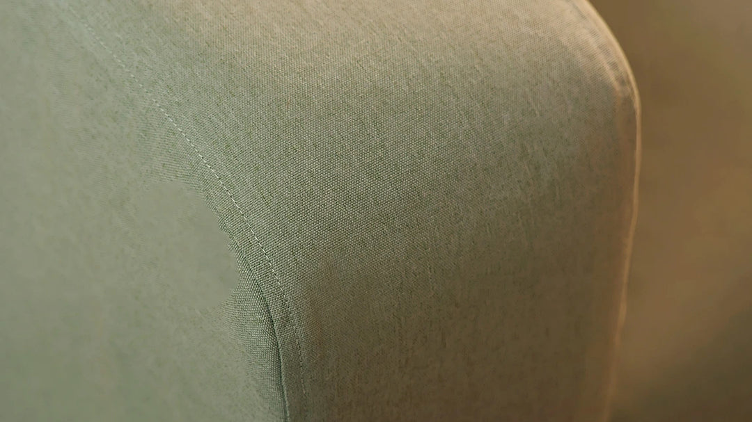 Closeup-of-sofa-arm-IKEA-KLIPPAN-2-seater-with-ComfortWorks-Care+-Canvas-Sage-colour