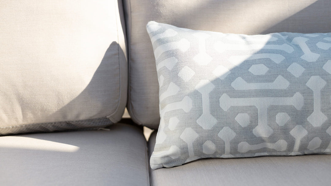 Closeup-of-sofa-and-cushion-in-ComfortWorks-Sunbrella-Canvas-Flax