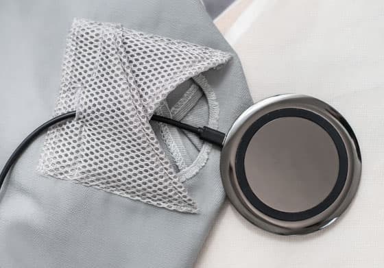 Close-up of the wireless charger from the sofa couch smart accessories slipcover